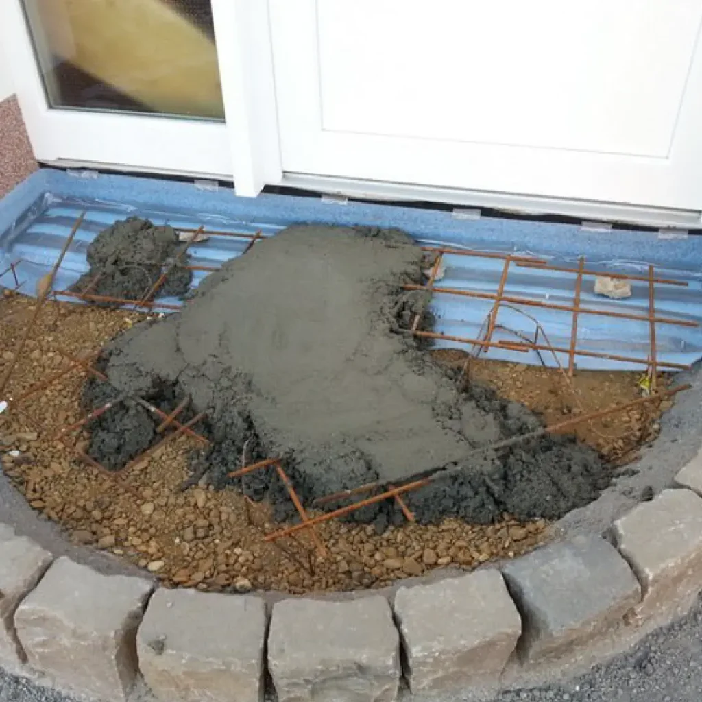 a concrete foundation in a concrete circle