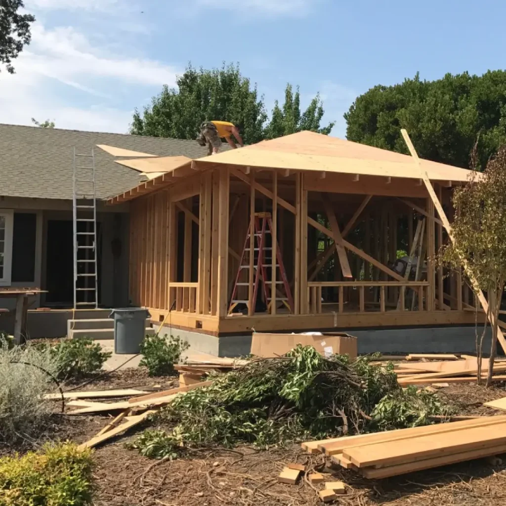 a house under construction with a ladder and a ladder