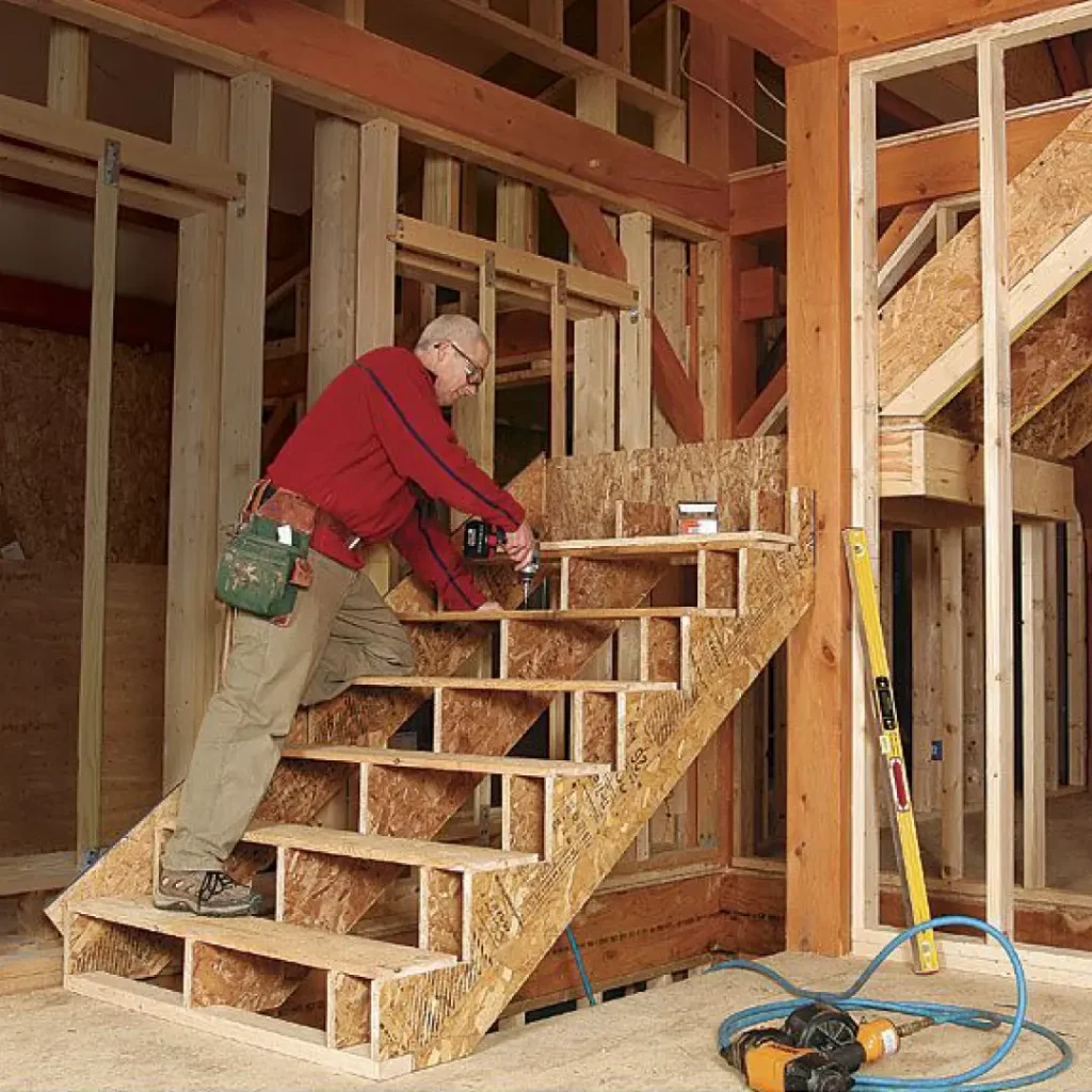 a person working on a set of stairs